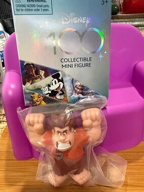 100 years -Disney Ralph Collectible Mini Figure in Red and Brown